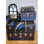 Three hard travel trunks, with metal strapping, handles, 93cm x 51cm x 35cm (largest),