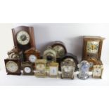 A collection of mantel clocks, carriage clocks, anniversary clocks, wall clocks and barometers,