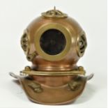 A decorative copper and brass divers helmet, 18 x 18cm