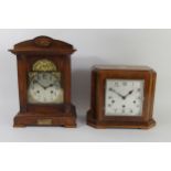 An oak cased early 20th Century mantel clock, 8 day Junghans movement striking to gong, 37cm tall,