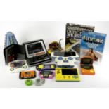 A collection of fifteen handheld and tabletop electronic games (spares or repairs), to include