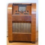 An un-branded floor standing valve radio (serial No 34896), believed to be 1930s, mahogany case,