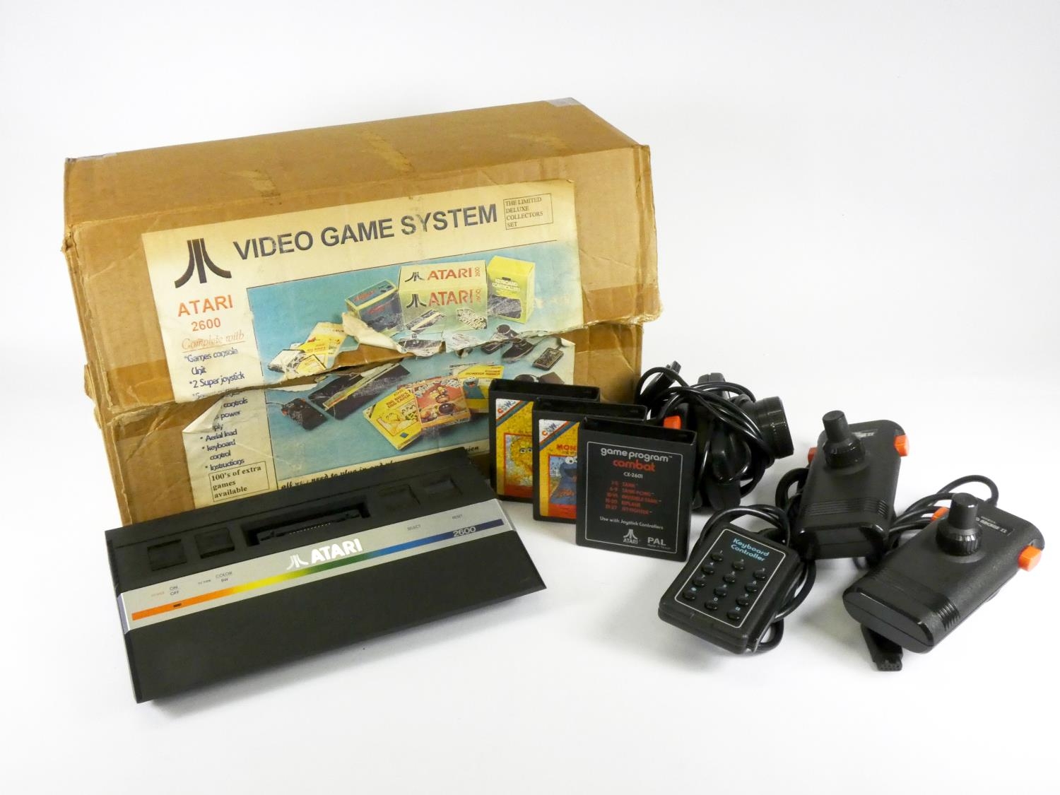 An Atari 2600 video game system: The Limited Deluxe Collectors Set, original box with large coloured