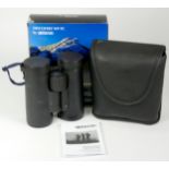 A pair of Opticron Discovery WP PC Mg 10x42 binoculars, with soft case, manuals and original box,
