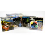 Four electronic tabletop games, boxed, to include Vtech Mini Wizard (no manual), CGL Earth