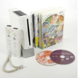 A Nintendo Wii Console, with two Wii remotes, light bar, stand, AV and power cables, manual,