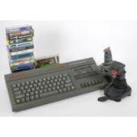 A Sinclair ZX Spectrum +2, with two joysticks and power cable, together with eighteen Spectrum