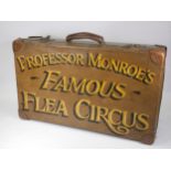 A suitcase, decorated with Professors Monroe's Famous Flea Circus, painted, 61cm x 35cm x 16cm