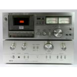 An Akai stereo intergrated amplfier (model AM-2250), with leads and original box, together with a