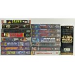 A collection of eighteen VHS tapes, including The Star Wars Trilogy box set, Star Wars, Star