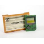 A Nintendo Game & Watch (Donkey Kong) multiscreen handheld game (serial No 42146207), together