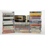 A collection of twenty three Commodore 64 cassettes, cased, to include Ramparts (insert), Shoot-