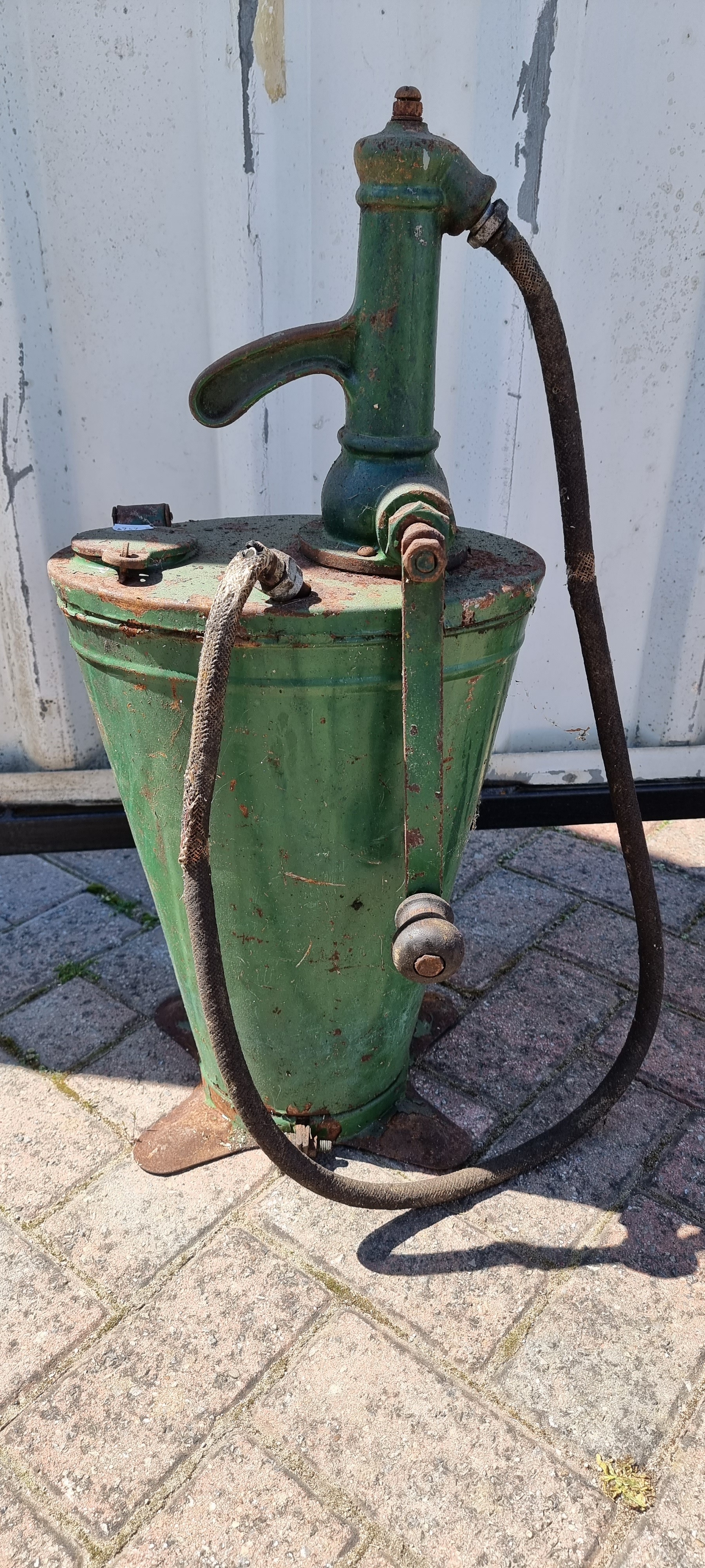 A green oil dispenser