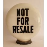 A Not For Resale glass petrol pump globe, small chip to base, 40 x 37cm.