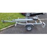 A Trelgo galvanised single axle single bike trailer, 350kg, with built in lighting and spare wheel