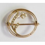 An Edwardian gold and half pearl hoop brooch, tests as 15ct, diameter 22mm, 2.8gm