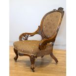 A Victorian carved rosewood button back parlour chair, with carved cabriole front supports, 97 x