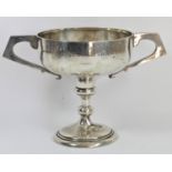A silver two handled trophy, Birmingham 1923, inscribed 'E.V.B. Taylor, Motorcycle Trophy', raised