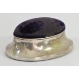 A silver mounted pin cushion/trinket box, Birmingham 1914, of oval form, the hinged lid opening to