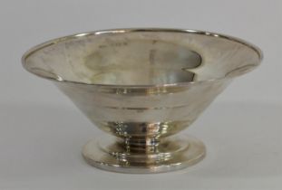 A silver circular stepped bowl, Birmingham 1943, raised on a stepped foot, diameter 15cm, 177gm.
