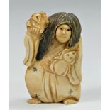 A carved ivory netsuke of a man with a spinning head, signed, 5cm