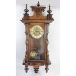 Friedrich Mauthe, Schwenningen, Germany, a late 19th century Vienna style walnut wall clock, brass