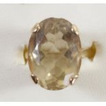 A 9ct gold and citrine dress ring, 18 x 13mm, L, 6gm.