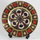 A Royal Crown Derby Imari 1128 pattern dinner plate gold banded, printed marks, 27cm.