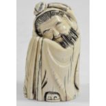 An early 20th century Japanese ivory okimono, depicting a robed wise man, character mark to base,