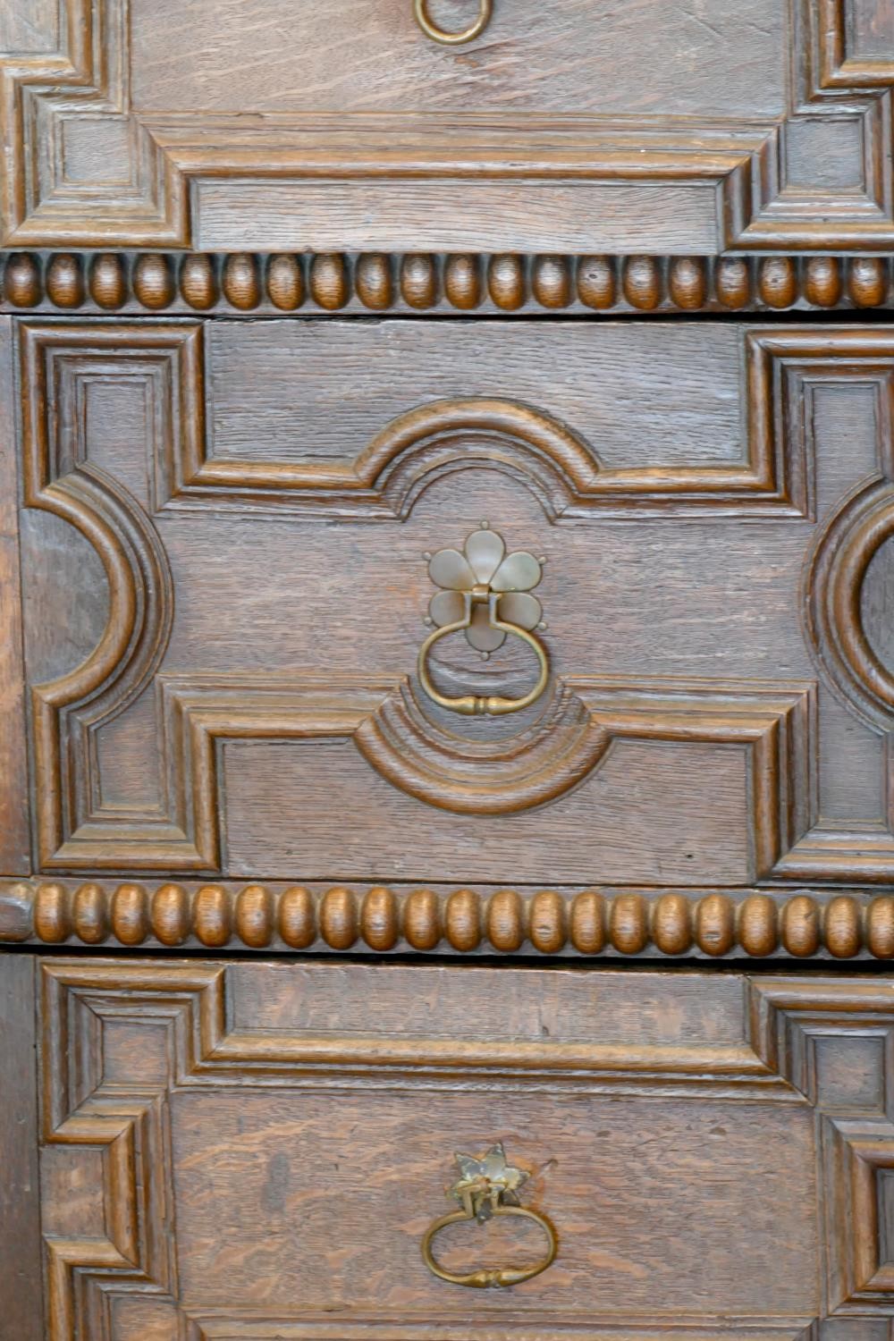 A late 17th century oak chest of three long drawers, two plank top over geometric moulded drawer - Image 2 of 5