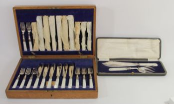 An electroplated and mother of pearl handled set of twelve pairs of fish eaters, ferrules