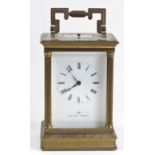 Matthew Norman, a gilt brass half hour striking and repeating carriage clock, white enamel dial with