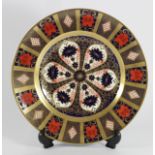 A Royal Crown Derby Imari 1128 pattern dinner plate gold banded, printed marks, 27cm.