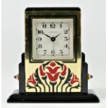 Cartier, an Art Deco style gilt brass and lacquer adjustable quartz alarm clock, numbered 890701551,