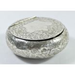 An Edwardian silver squeeze action tobacco box Birmingham 1906, floral engraved decoration, 7cm