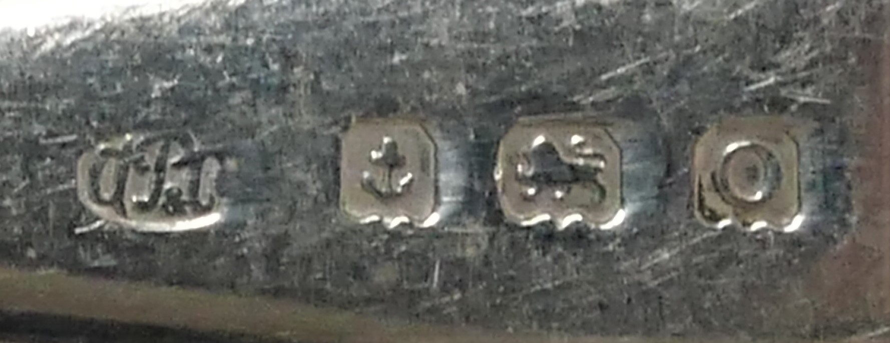 A silver set of twelve teaspoons and tongs, Birmingham 1938, 174gm. - Image 2 of 2