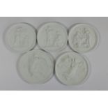 Royal Copenhagen, a collection of five bisque plaques, decorated with classical scenes, 14cm x 3,
