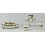 A Crown Ducal Art Deco Orange Tree (A1211) pattern part breakfast service to include, four egg