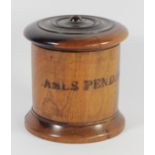 A Victorian lignum vitae string box, of cylindrical form with domed screw fitting cover, stamped