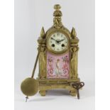 A 19th century French gilt metal and porcelain mantle clock, the dial with Arabic numerals, the case