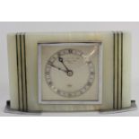 Elliot for Garrard & Co. Ltd., London, a white onyx and malachite presentation mantle clock, the