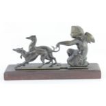 A bronze group of a winged cherub being pulled by a pair of greyhounds, late 19th century, 19cm,