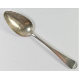 A George III silver Old English pattern table spoon, makers mark JWE, thrice, untraced, possibly