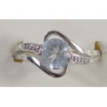 A 9ct white gold aquamarine and diamond dress ring, N 1/2, 3.1gm