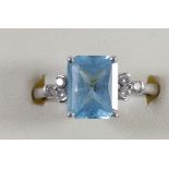 A 9ct white gold blue topaz and diamond dress ring, 10 x 8mm, O, 2.8gm