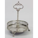 A George III silver five bottle cruet frame, marks worn, probably London 1769, cast handle (lion