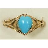 An 18ct gold Art Nouveau turquoise expending ring, claw set with a heart shape stone, sinuous