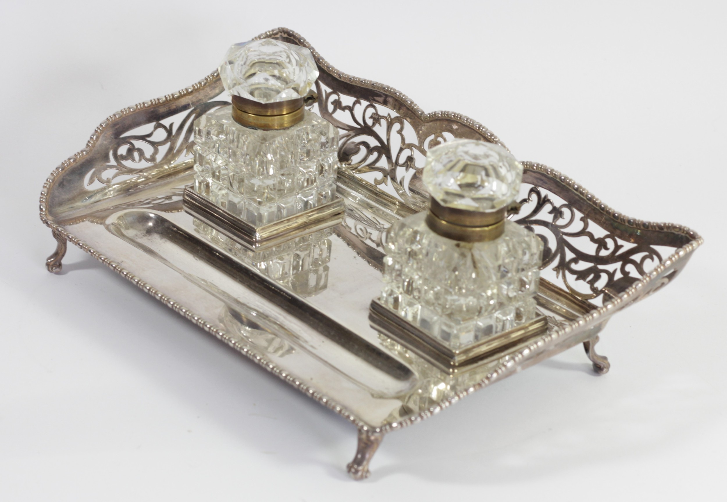 An electroplated two bottle desk stand, 3/4 pierced gallery with gadrooned border, cut glass brass - Image 2 of 4