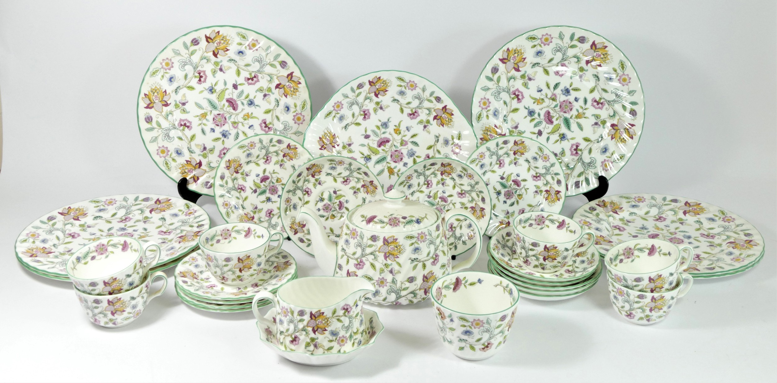 A Minton Haddon Hall tea service for six place settings, to include, a platter (27 cm), bon bon dish