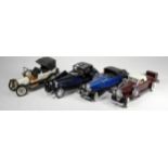 Four Franklin Mint 1:24 scale die cast car models, to include a 1933 Bugatti Royale Coupe